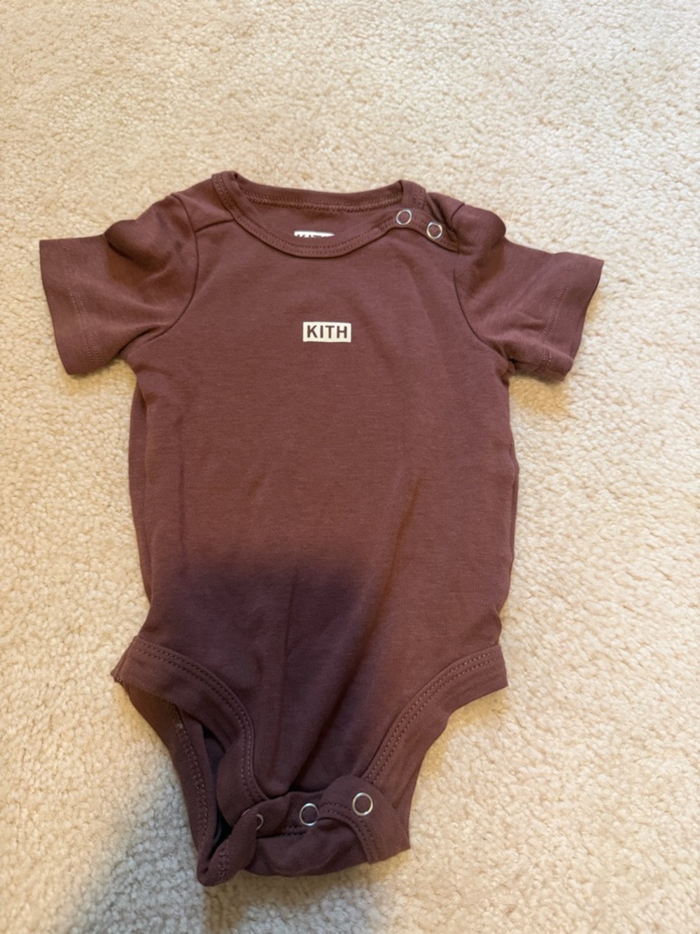 Kith Short-Sleeve One-Piece Bodysuit in deep red/brown